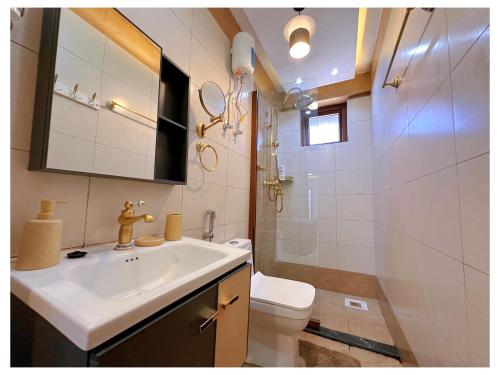 Et badeværelse på Sandy shores apartments