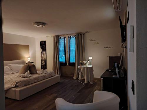 Postel nebo postele na pokoji v ubytování Relais Villa Lézard