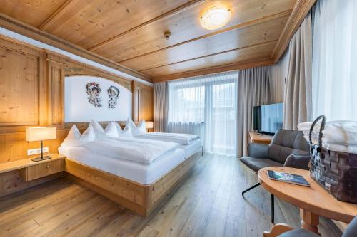 Postel nebo postele na pokoji v ubytování Hotel Englhof