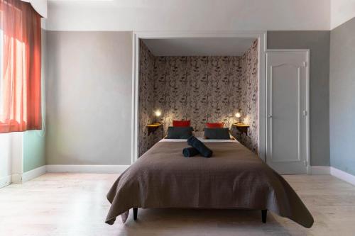 Postel nebo postele na pokoji v ubytování Maison Louis - Maison 3 chambres sur 2 niveaux, cœur de ville