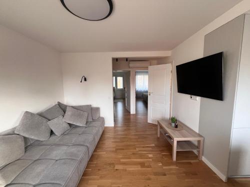 Et tv og/eller underholdning på Apartamentai Akvilė