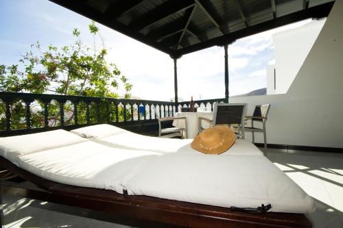 En eller flere senge i et værelse på Casa Elena Playa - By AZ Rentals