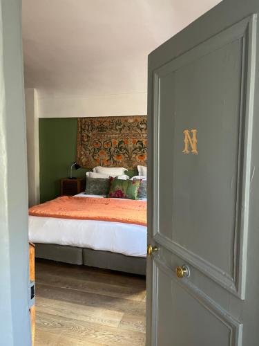 Postel nebo postele na pokoji v ubytování Le 66