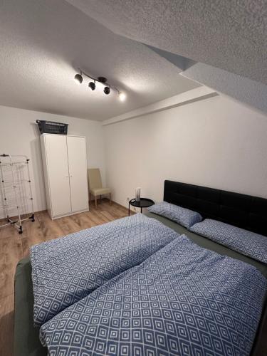 En eller flere senge i et værelse på Ferienwohnung AyNa 3, direkt an der Schweizer Grenze