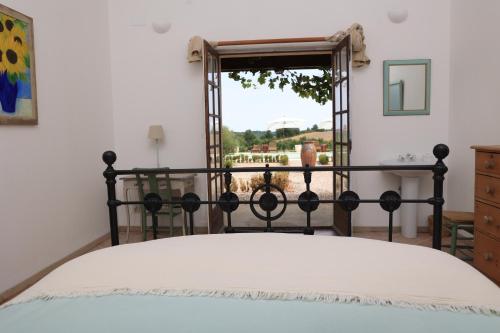 En eller flere senge i et værelse på Poolside 3