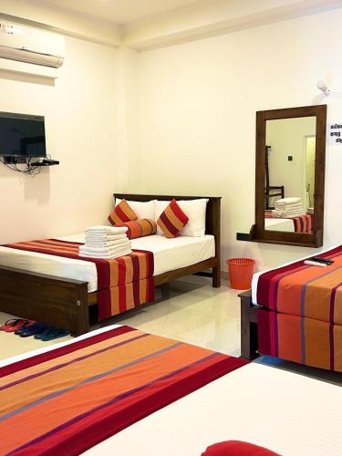 Katil atau katil-katil dalam bilik di Golden Residence