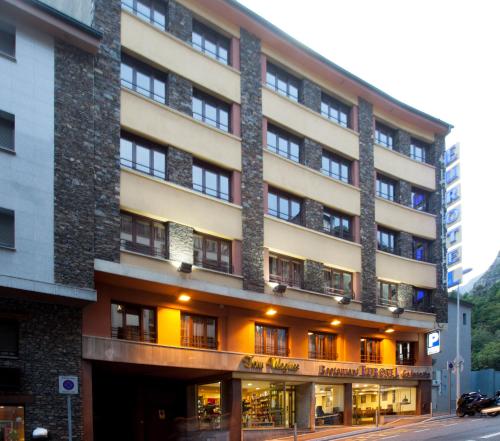 a large building on a city street at Insitu Eurotel Andorra in Andorra la Vella