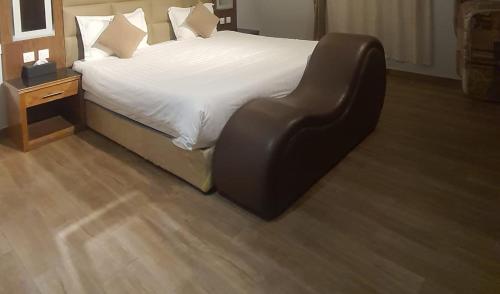 Ένα ή περισσότερα κρεβάτια σε δωμάτιο στο mashotelabha