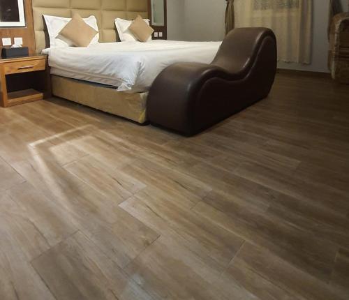 Ένα ή περισσότερα κρεβάτια σε δωμάτιο στο mashotelabha