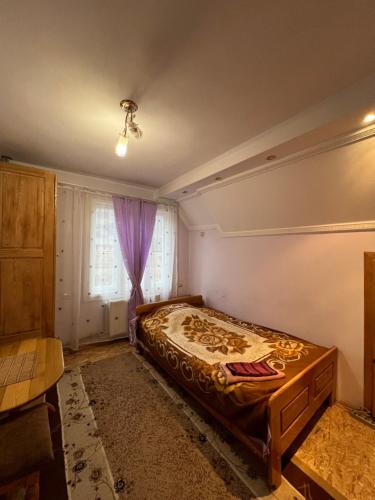 En eller flere senge i et værelse på Zelenyj Gaj