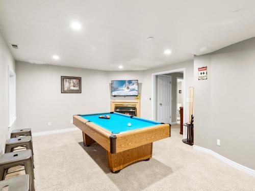 a living room with a pool table in it at Alpine Base Camp Hot Tub 1Gbps pool table foosball in Cottonwood Heights