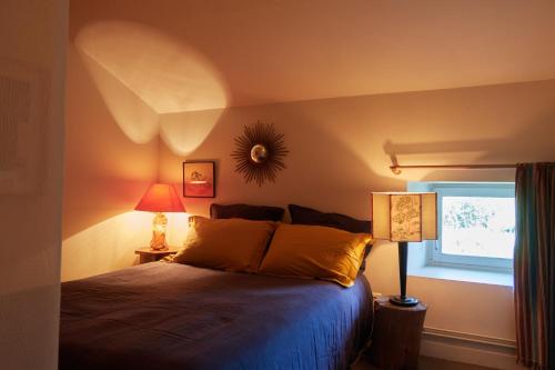 Postel nebo postele na pokoji v ubytování la chaume st martin