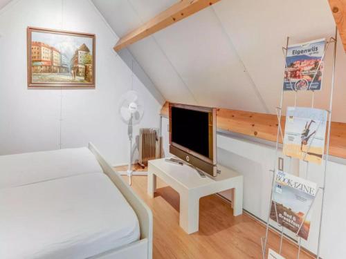 Giường trong phòng chung tại Wellnesshuisje Engelse Tuin