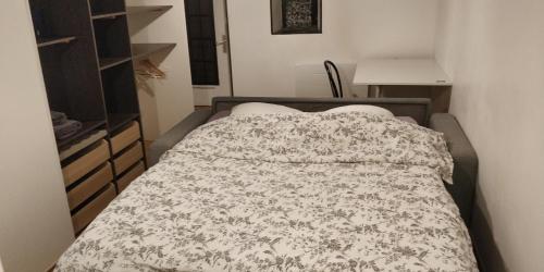 Postel nebo postele na pokoji v ubytování Chambre chez l'habitant en plein centre de Bures