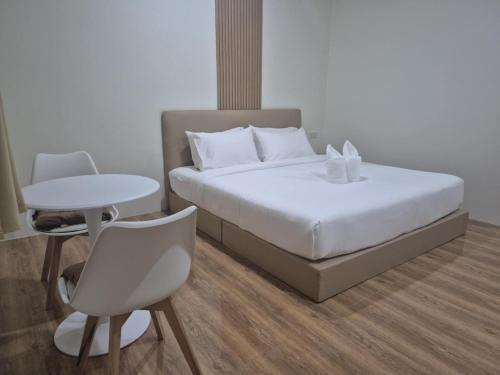 Postel nebo postele na pokoji v ubytování Cozy Stay Koh Yao Yai