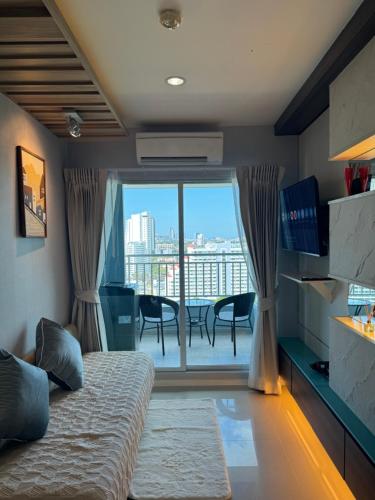 Et tv og/eller underholdning på Lumpini Park Beach Jomtien Pattaya Condo 21F