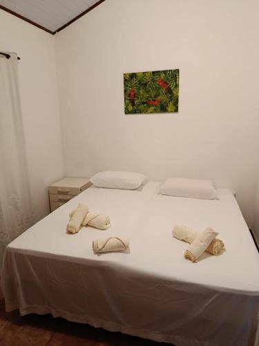 Postel nebo postele na pokoji v ubytování Casa Manacá