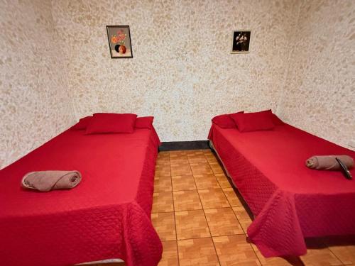 Ένα ή περισσότερα κρεβάτια σε δωμάτιο στο Cristales de Antigua Hotel Cristal