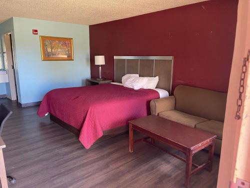 Postel nebo postele na pokoji v ubytování Mayfair Inn