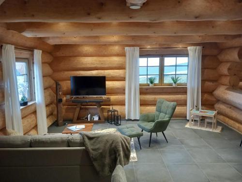 Khu vực ghế ngồi tại Ferienhaus Waldruhe