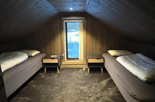 Postel nebo postele na pokoji v ubytování Gemütliche Hütte in traumhafter Natur auf 1000 m