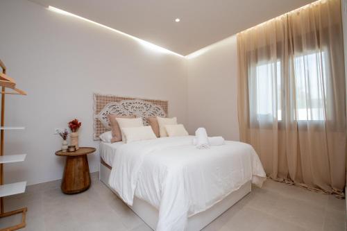 Postel nebo postele na pokoji v ubytování casa mediterranea