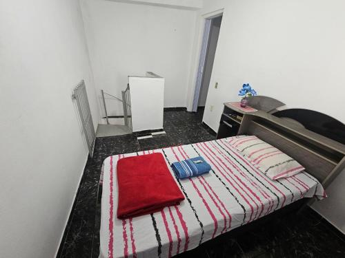 En eller flere senge i et værelse på Casa Completa com Rede próxima ao Aeroporto de Guarulhos