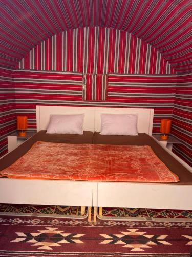 En eller flere senge i et værelse på Camp in the natural reserve & tours