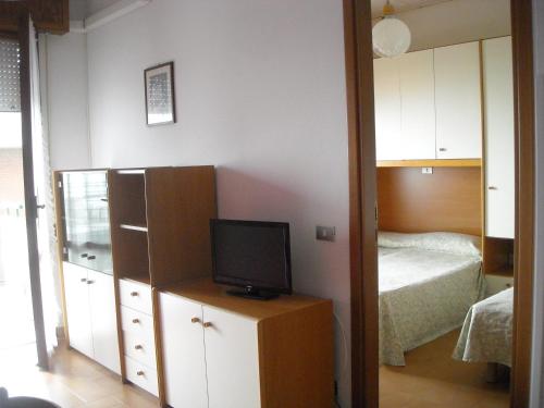 Postel nebo postele na pokoji v ubytování Hotel Residenza Giardino