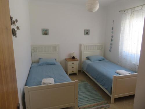 En eller flere senge i et værelse på Casa A