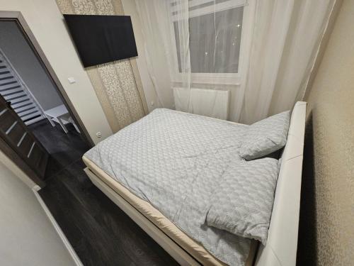 Postel nebo postele na pokoji v ubytování Apartament Daisy 2