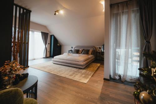 En eller flere senge i et værelse på Nature Nest Noszvaj