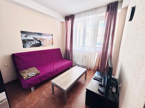 Телевизор и/или развлекательный центр в 2-room Apartment NFT Gudauri Penta 404