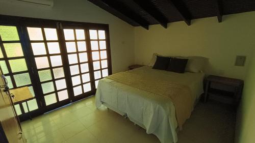 Llit o llits en una habitació de Villa Loma
