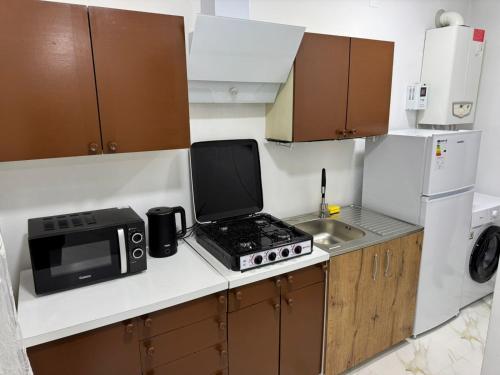 Cuisine ou kitchenette dans l'établissement NAPO HOTEL სასტუმრო ნაპო