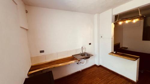 a bathroom with a sink and a mirror at Mar y Mar Zipolite in Zipolite