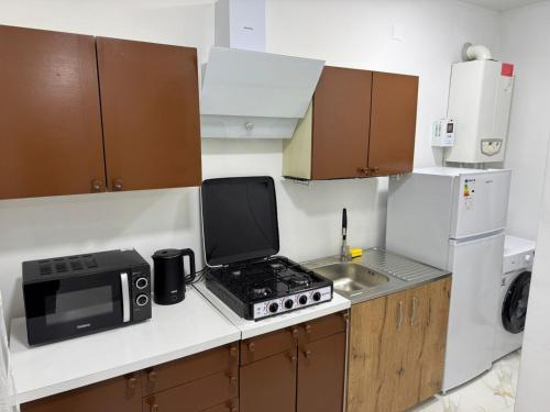 Køkken eller tekøkken på NAPO HOTEL სასტუმრო ნაპო