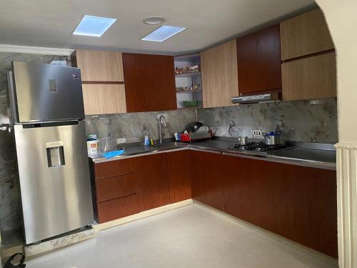 Kuchyň nebo kuchyňský kout v ubytování Saint Fernand Apartment