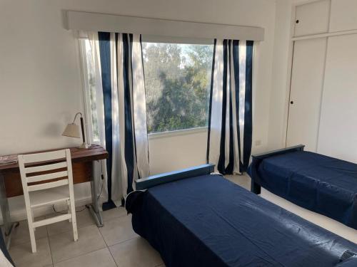 Postel nebo postele na pokoji v ubytování Casa Del Lago