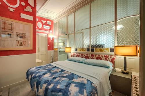 En eller flere senge i et værelse på Museo Privato Appartamento in assoluto centro