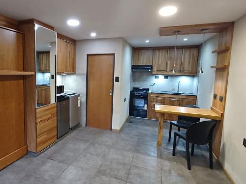 Køkken eller tekøkken på Cabañas km7 Bariloche