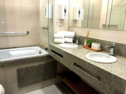 Et badeværelse på Stilo Prime Flat com Hidro