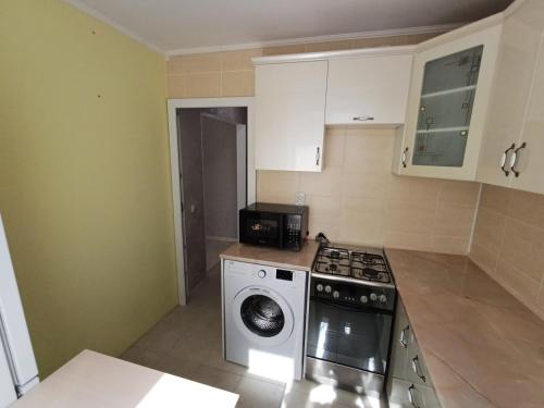 Kuchyň nebo kuchyňský kout v ubytování Up!House