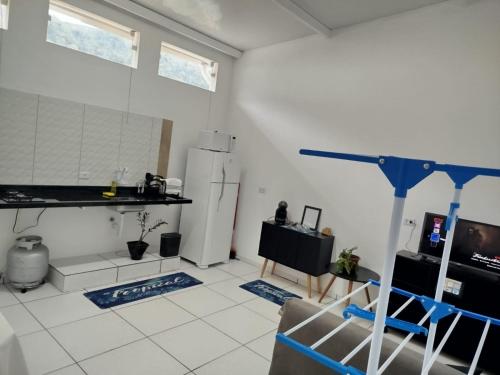 Køkken eller tekøkken på Apartamento São Sebastião - 1,5km da balsa Ilhabela