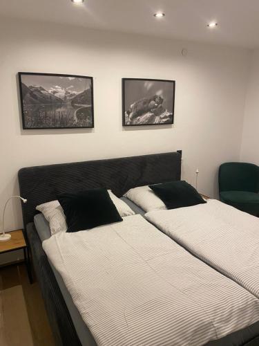 En eller flere senge i et værelse på Dahoam by Sarina - Die Homebase