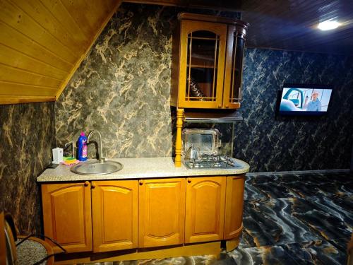 Køkken eller tekøkken på Quba A-Frame near Lake & Forest 2