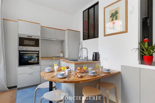 Residence d'Exception Renovee par Architecte - Paris 10