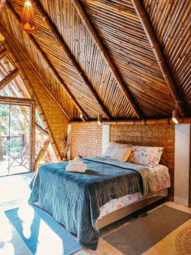 Giường trong phòng chung tại Aldeia Alegria