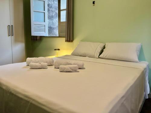 En eller flere senge i et værelse på Casa Jutaí - your home in Belém