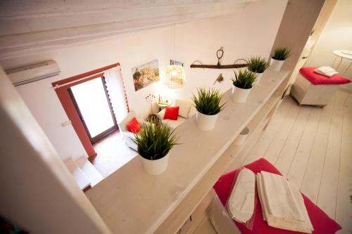 Ένα ή περισσότερα κρεβάτια σε δωμάτιο στο La Casa Sulla roccia